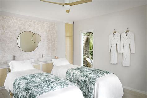 dior curates serene wellness cabins at taormina's grand hotel timeo.